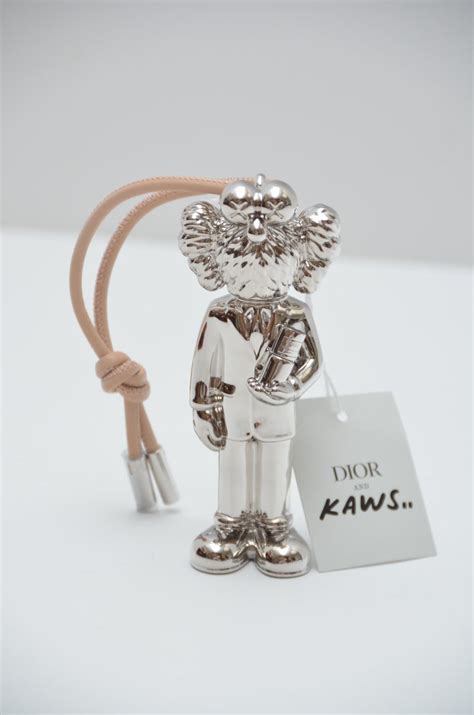 dior statue|kaws and dior for sale.